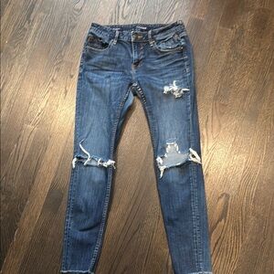 Distressed Blue Jeans